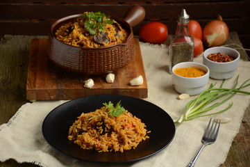 Rice with meat and mushrooms