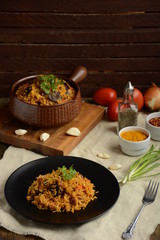 Rice with meat and mushrooms