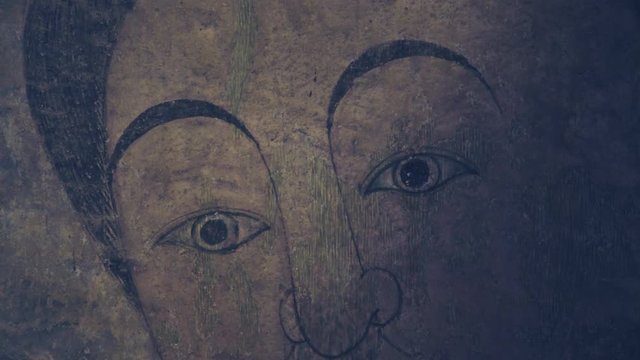 mural painting portrait of a woman looking forward close up shot