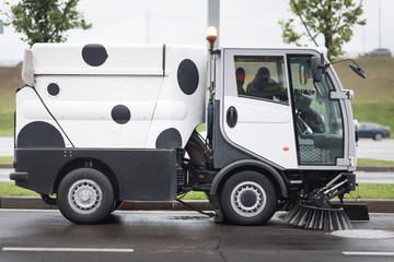 A street sweeper machine cleaning the streets. - 185761038