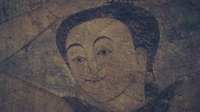 mural painting portrait of a woman looking forward close up shot