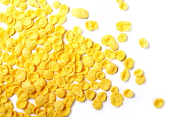 Corn flakes isolated on white background, top view