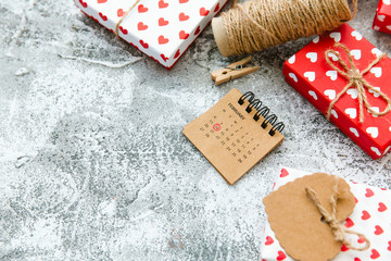 Calendar with gift boxes for  February 14 of Saint Valentines day.