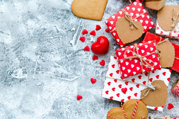 Valentines day gift boxes with heart shaped cookies and decorations. Holiday love background .