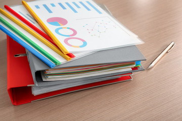 Stack of documents on table