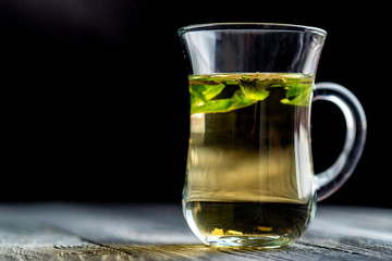 Herbal tea with honey and mint leaves