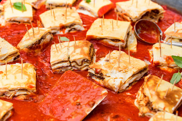 Close-up of tasty lasagna in baking dish