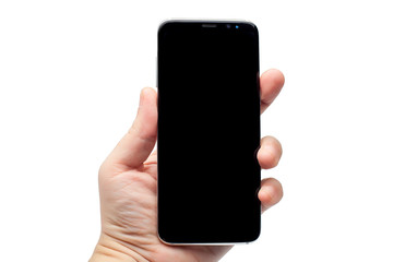 Smartphone in hand on a white background.