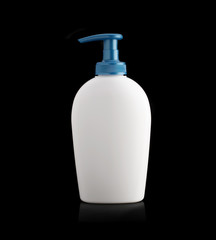 White perfume bottle on a black background