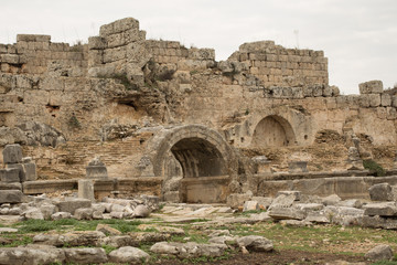 stone wall and arch in ancient Perge