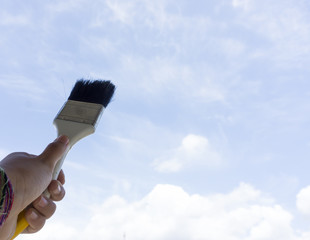 paint brush handles are sky and cloud