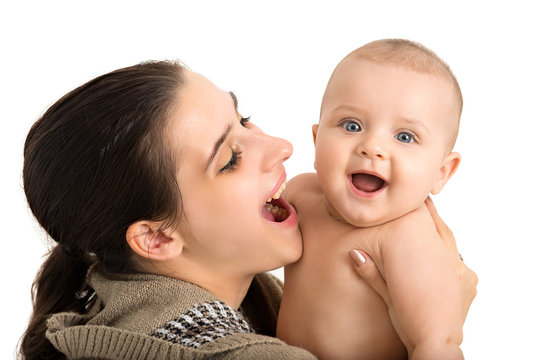 Bright photo of a cute and happy baby boy in his loving mother hands