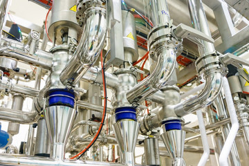 Industrial factory equipment stainless tubes food automation.