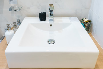 Interior of bathroom with sink basin faucet and mirror. Modern design of bathroom