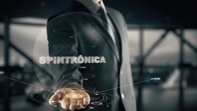 Spintr&ocirc;nica with hologram businessman concept, in English Spintronics