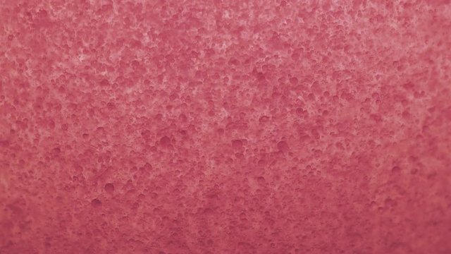 Analog Pink Micro Bubbles Falling Slowly Through Oily Water
