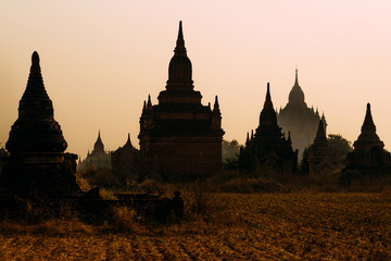 BAGAN, MYANMAR - March 6, 2017: Silhouette of temples in Bagan. Ancient Pagoda. Sunrise in Bagan