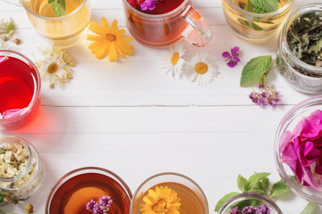 herbal tea in cups on a white background