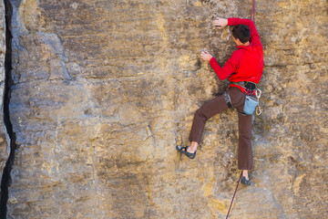 climber climbs the rock..