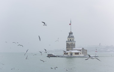 Snowy day in Uskudar. View of Maiden's Tower in Uskudar, Istanbul, Turkey.