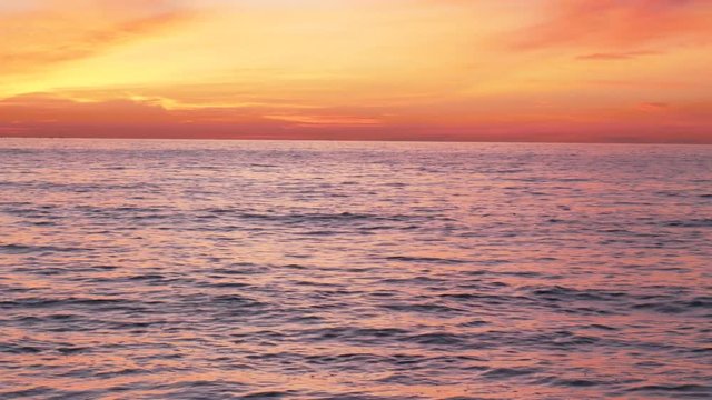 Beautiful seascape. Calm sea shore at sunset. Composition of nature.