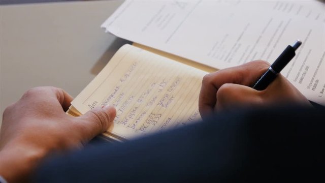 Upper View Business Man Opens Leather Notebook Closeup