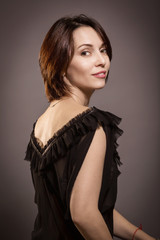 Fototapeta premium Portrait of a beautiful young woman close-up