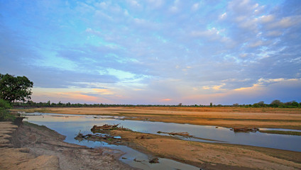Scenic view of the Luangwa River at sunset, with a nice cloudscape in South Luangwa National Park, Zambia, Southern Africa
