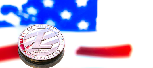 coin of litecoin on an American flag background, the concept of virtual money