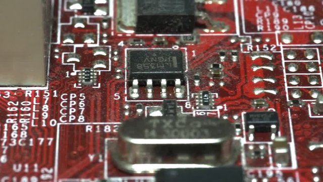 a slider shot of electronic components on a computer mainboard-recorded at 60fps
