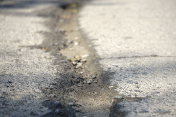 cracked asphalt after earthquake