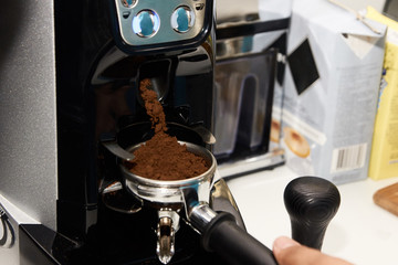 Coffee machine. Morning drink. Preparation of espresso
