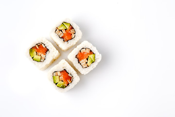 Original Japanese dish rolls with seafood, ginger and wasabi isolated on black background