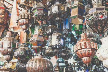 Shining moroccan metal lamps and souvenirs in the shop in medina of Marrakech, Morocco © Curioso.Photography