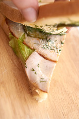 Sandwich with ham. Green salad