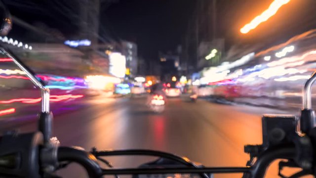 First Person View Timelapse: Motorbike Ride at Night Streets of Patong in Traffic near Bangla Road. Phuket, Thailand. 4K.
