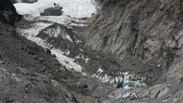 a vertical pan of the glacier at franz josef on the west coast of new zealand