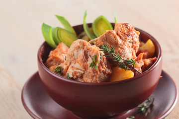 Braised  meat with potatoes and carrots.