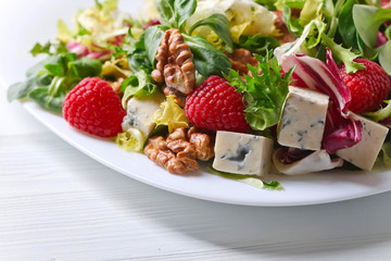 Green salad with blue cheese.
