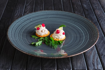 Appetizer for reception.  Fish pate with lemon and cranberry