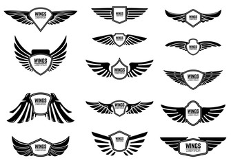 Set of blank emblems with wings. Design elements for emblem, sign, logo, label. © liubov