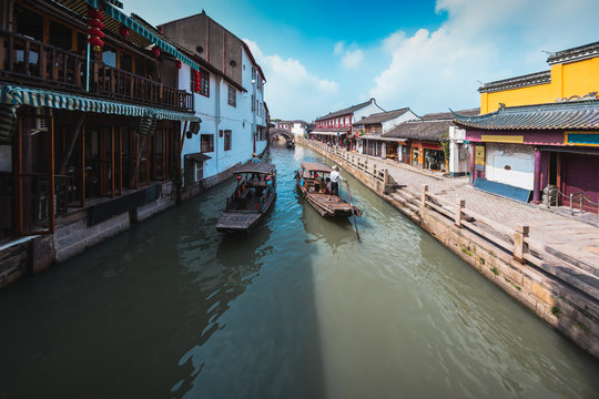 China traditional tourist boats at Shanghai Zhujiajiao town with boat and historic buildings, Shanghai China