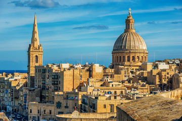 Fototapeta na wymiar Valletta, Malta: aerial view from city walls in the morning. The cathedral