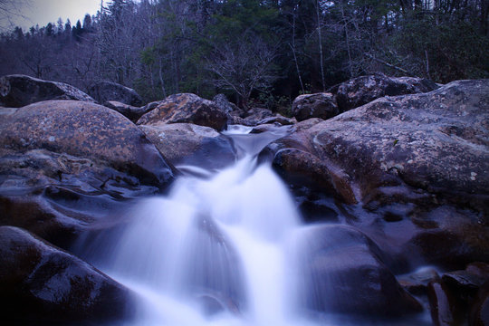 Slow Shutter Photography of a River Waterfall in the Woods of the Great Smokey Mountains National Park.
