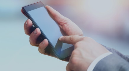 Man hand holding phone