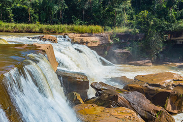Beautiful waterfall in green forest in jungle in the mountain
