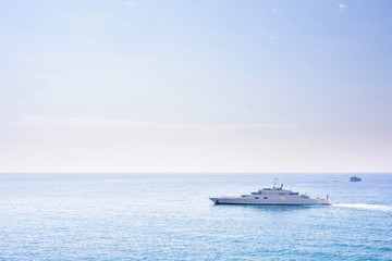 Fototapeta na wymiar Daylight sunny view to yacht cruising on water