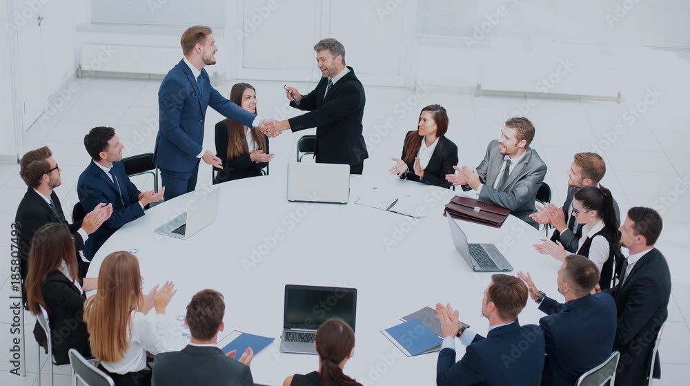 Sticker head of the company speaks to colleagues at conference