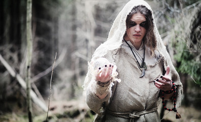 Fairy magician. A sorcerer with a glass sphere, a magical spell 