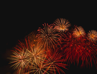 Fototapeta premium Fireworks light on the sky in beautiful night with dazzling display of celebration day holiday
